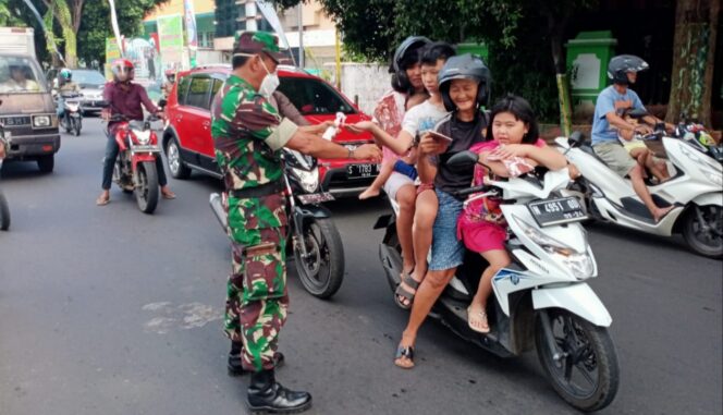 
					NRPG dan Kodim Bagi Masker untuk Warga
