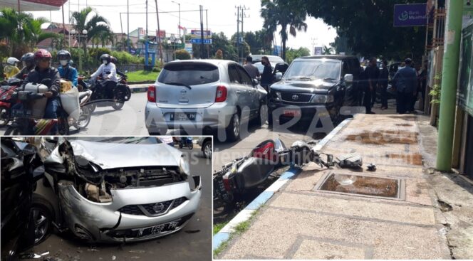 
					LAKA: Kecelakaan beruntun antara Nissan March, Pemotor dan Mobdin(foto: Hafiz Rozani)