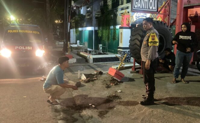 
					Polisi lakukan olah TKP.