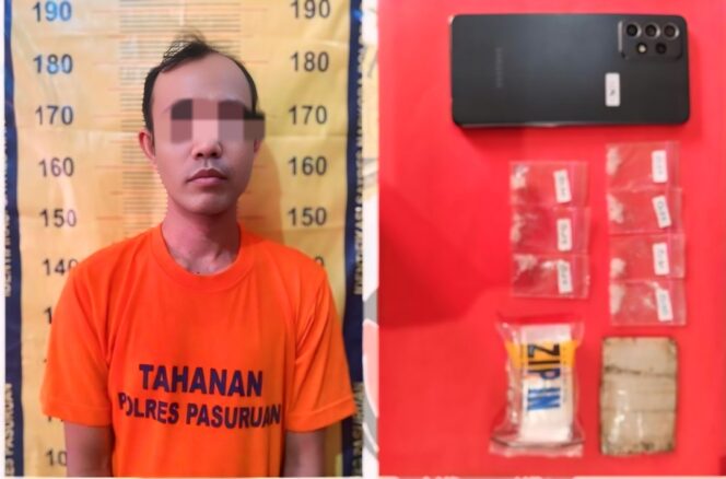 
					Tersangka Ahmad Fatoni beserta barang bukti.