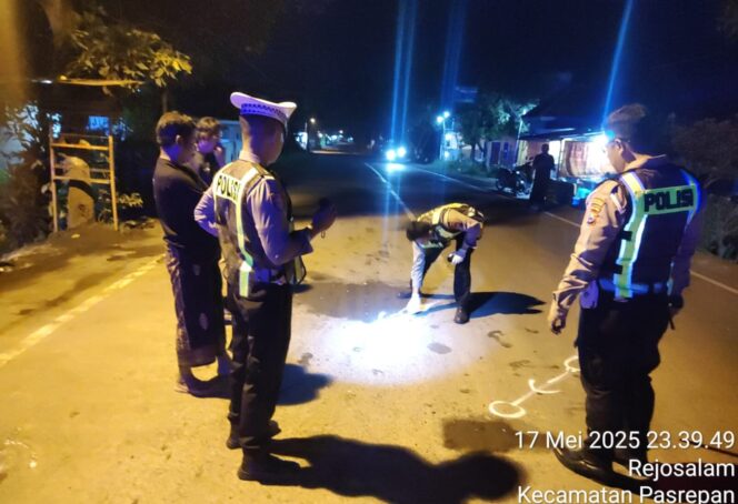 
					Polisi melakukan olah TKP.
