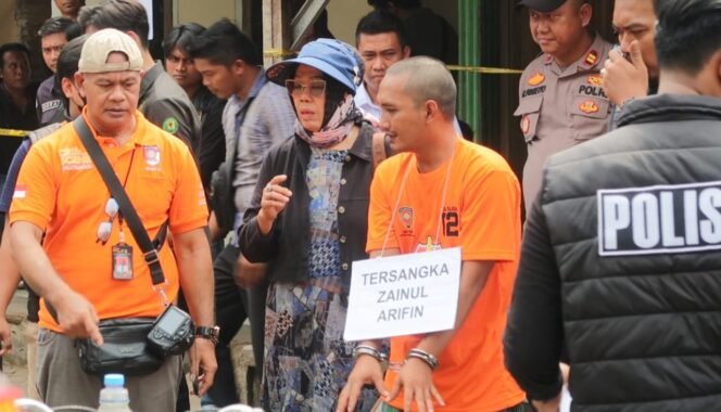 
					Tersangka Zaenul Arifin.
