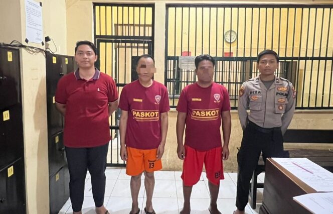 
					Dua tersangka kasus pengiriman TKI ilegal.
