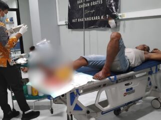 Residivis Misnaton saat dirawat di rumah sakit usai ditembak polisi.  (Foto: Asmadi).
