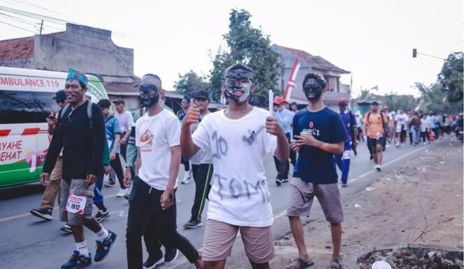 
					GERAK JALAN: Warga saat mengikuti Gerak Jalan Tanggul–Jember (Tajemtra) tahun 2024 lalu. (foto: Dok. Diskominfo Jember).