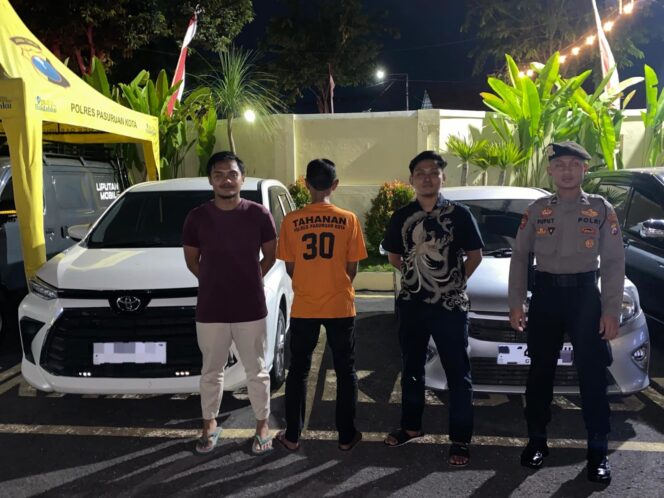 
					Kades Karangpandan saat diamankan di Mapolres Pasuruan Kota.
