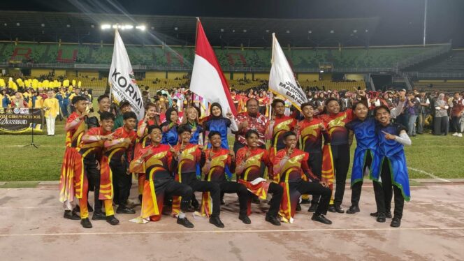 
					JUARA: Kontingen Jember Marching Band (JMB) saat di Stadion Darul Aman, Alor Setar, Malaysia. (Foto: Istimewa).