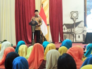 Wakil Wali Kota Pasuruan, M. Nawawi, memberikan sambutan dalam kegiatan Penguatan Komitmen Program Prioritas Bidang Kesehatan Tahun 2025 di Gedung Gradhika Bhakti Praja.